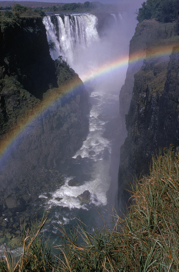 Rainbow At Victoria Falls #1 Photograph by George Holton
