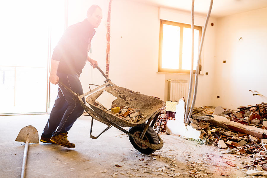 Real Italian worker repairing apartment #1 Photograph by LaraBelova