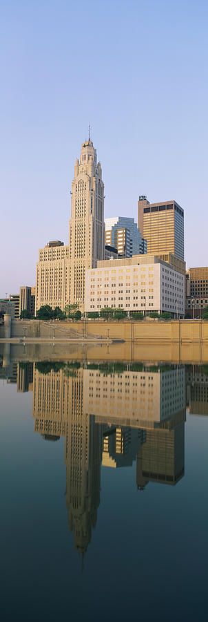 Columbus Photograph - Reflection Of Buildings In A River #1 by Panoramic Images