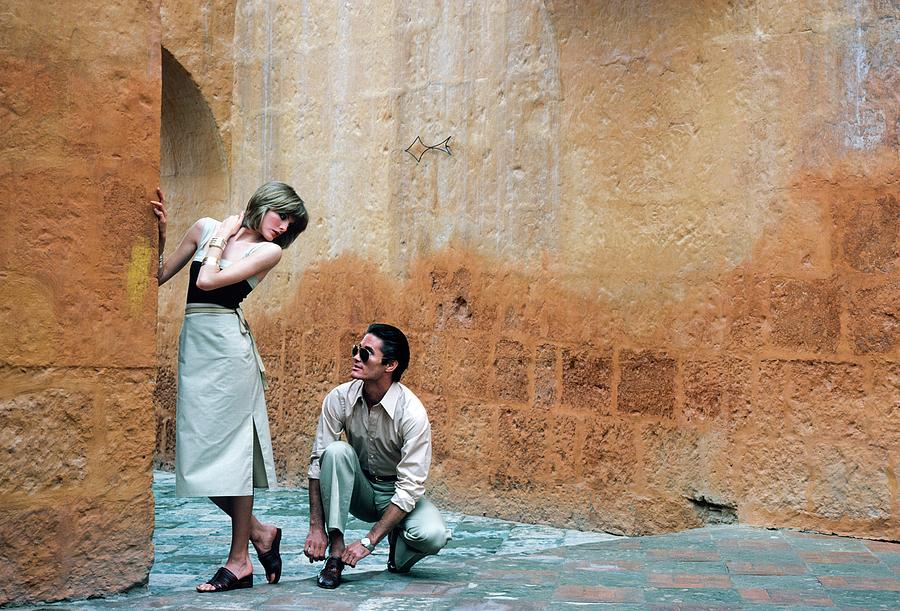 Rene Russo And A Male Model In Arequipa Photograph by Francesco Scavullo