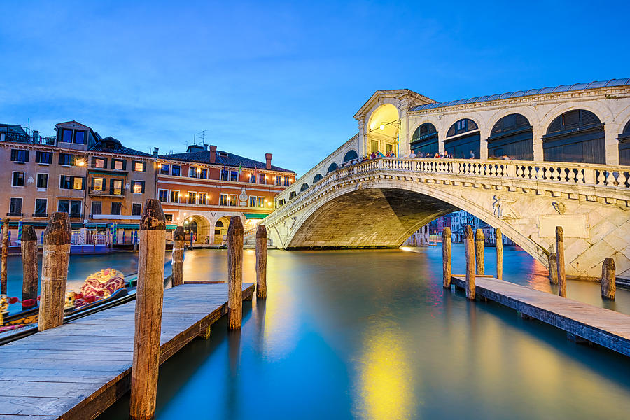 Bridge Photograph - Rialto bridge at night in Venice by Michael Abid