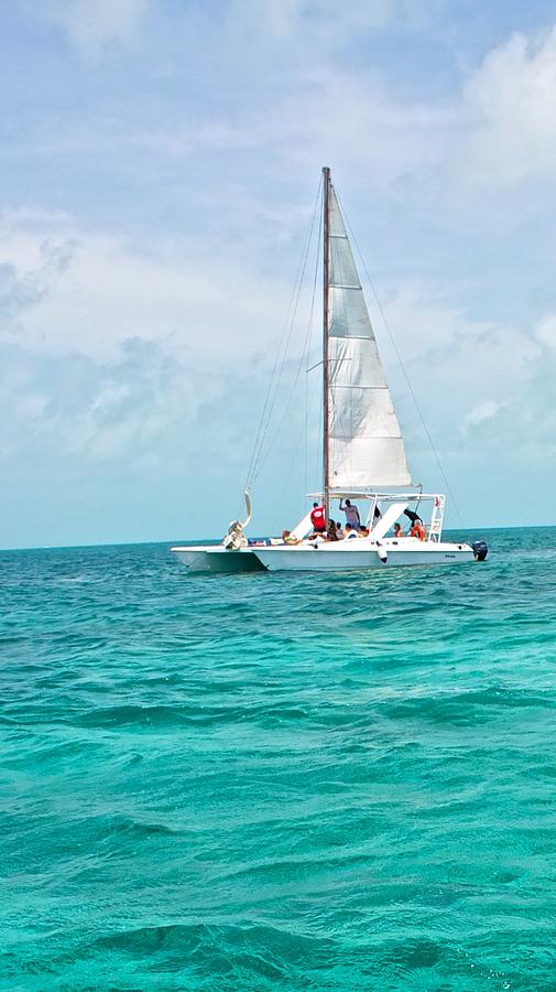 Sailing in Belize Photograph by Kristina Deane