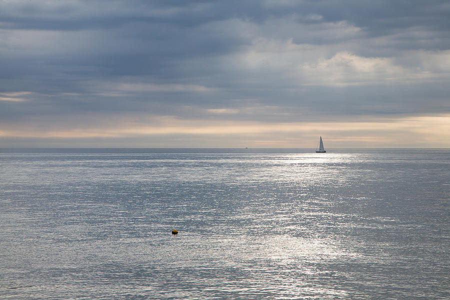 Sailing the silver sea. #1 Photograph by Ian Middleton