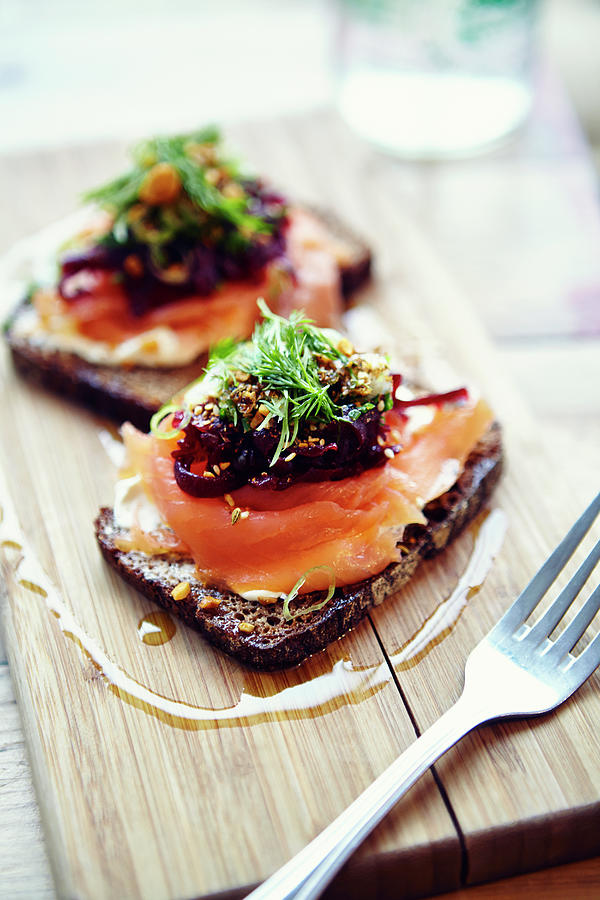 Salmon Tartine On Rye Bread On Wooden #1 Photograph by Jake Curtis