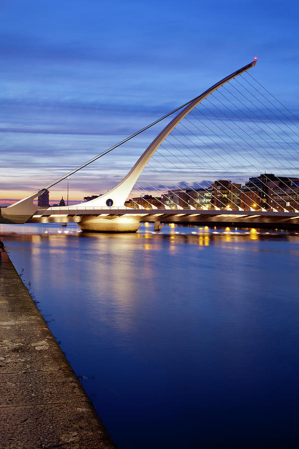 Architecture Photograph - Samuel Beckett Bridge At Dusk, Liffey #1 by Panoramic Images