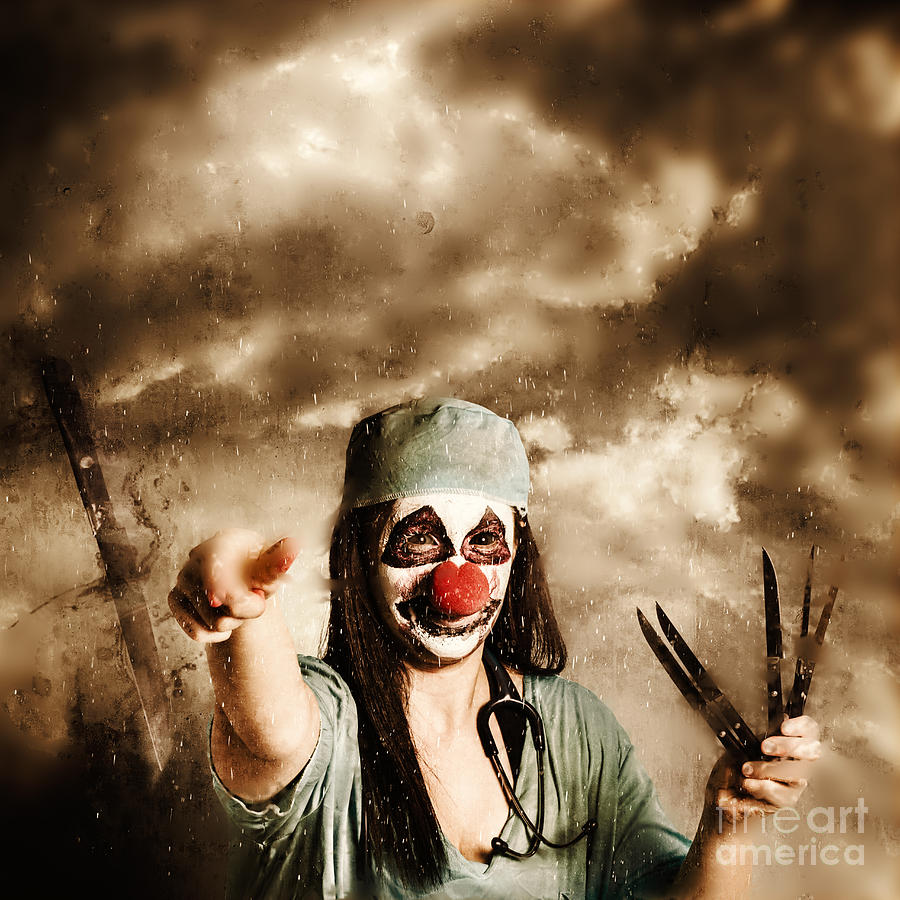 Scary clown doctor throwing knives outdoors #1 Photograph by Jorgo Photography