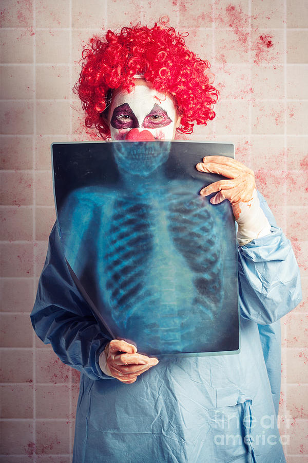 Scary clown peeking behind x-ray. Funny bones #1 Photograph by Jorgo Photography