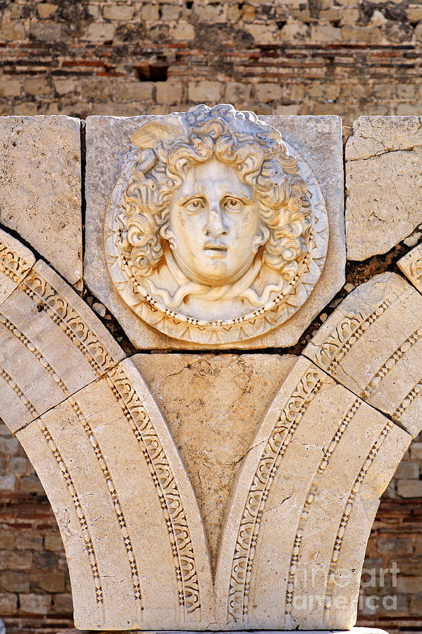 Architecture Photograph - Sculpted Medusa head at the Forum of Severus at Leptis Magna in Libya #1 by Robert Preston