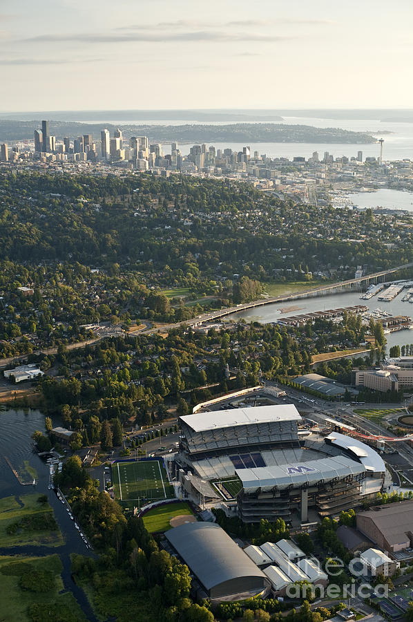 Seattle skyline with aerial view of the newly renovated Husky St #1 Photograph by Jim Corwin