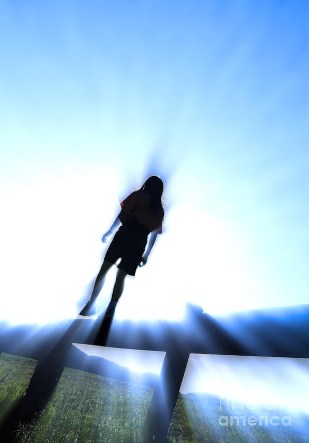Silhouette Of A Girl Walking Along A Wooden Railing Photograph
