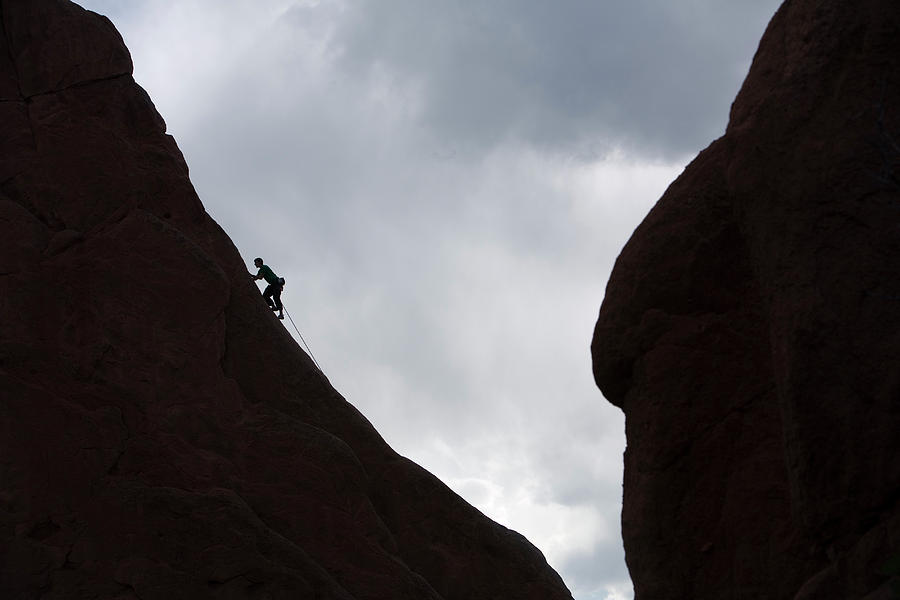 Silhouette Of A Man Rock Climbing Photograph By Corey Rich Fine Art America