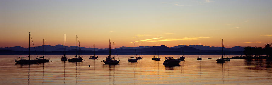 Sunset Photograph - Silhouette Of Boats In A Lake, Lake #1 by Panoramic Images
