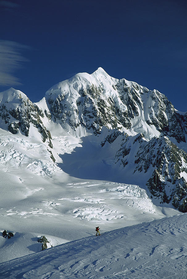 Ski Mountaineer And Mt Tasman Photograph by Colin Monteath
