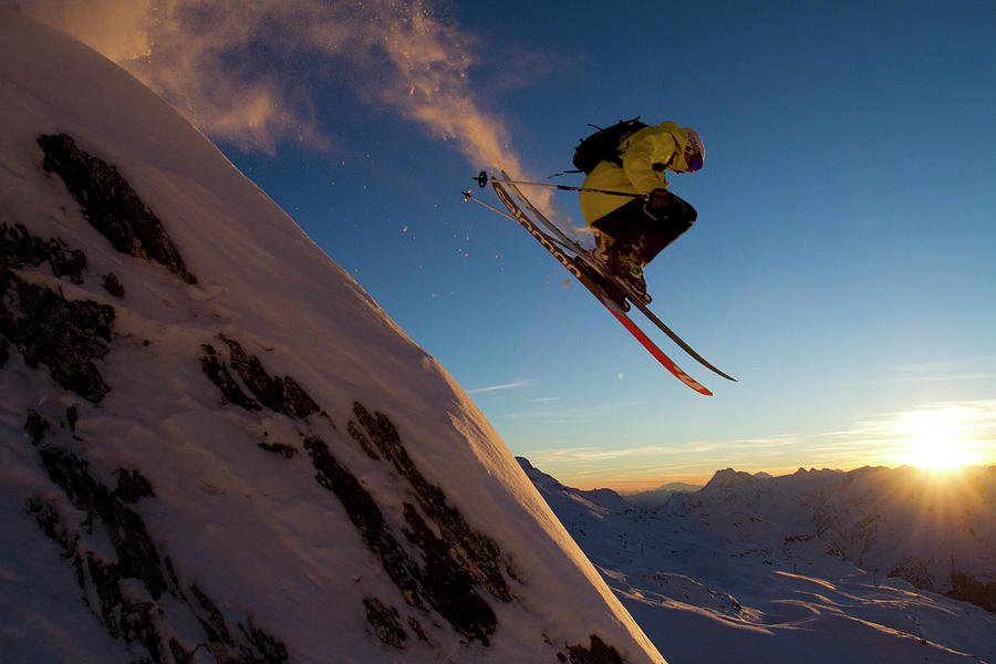 Sunset Photograph - Skier Jumping Off A Cliff At Sunset #1 by Adam Clark