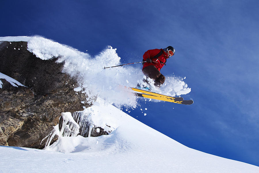Skier jumping on snowy slope #1 Photograph by Jakob Helbig