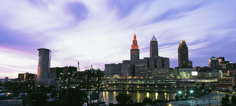 Architecture Photograph - Skyscrapers Lit Up At Dusk, Cleveland #1 by Panoramic Images