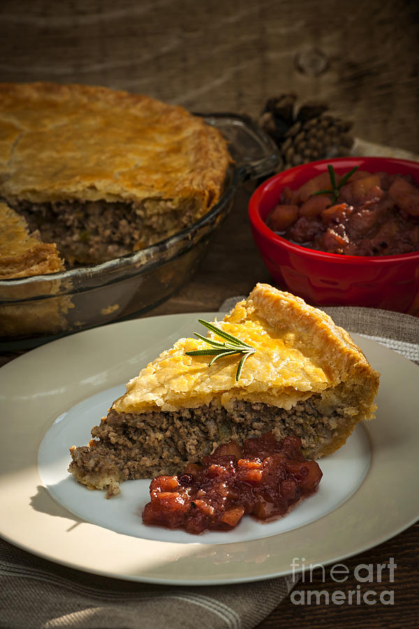 Slice of Tourtiere meat pie Photograph by Elena Elisseeva