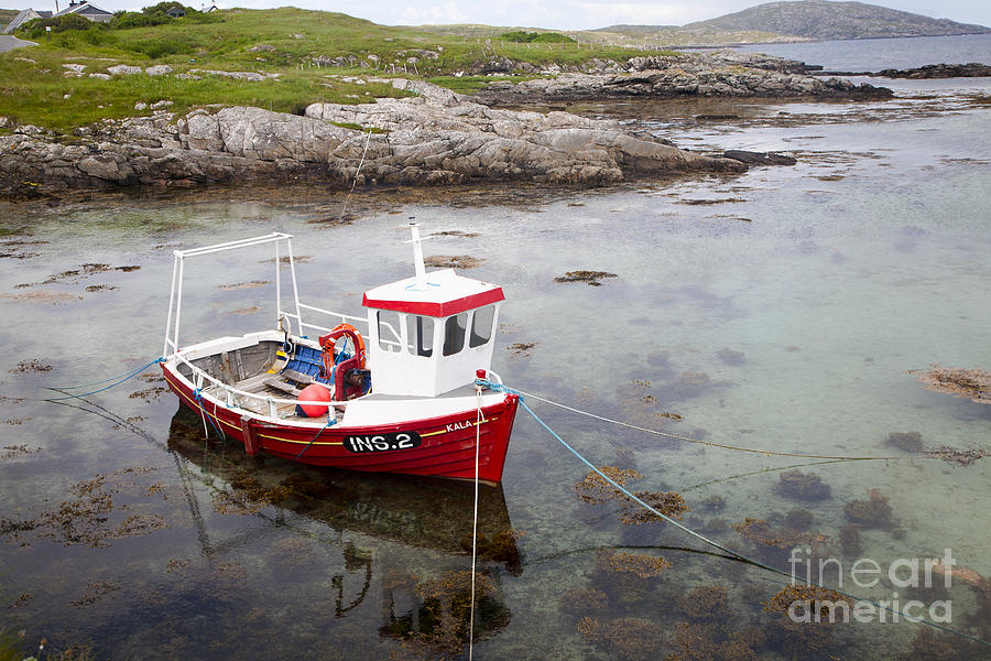 Small fishing boat on the east coast of Barra Outer Hebrides