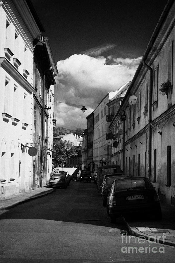 City Photograph - Small Narrow Street With On Street Parking In The Kazimierz District Of Krakow #1 by Joe Fox