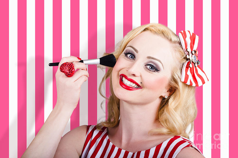 Smiling makeup girl using cosmetic powder brush #1 Photograph by Jorgo Photography
