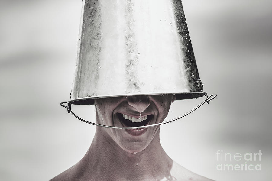 Smiling Man Laughing With Ice Bucket On Head Photograph