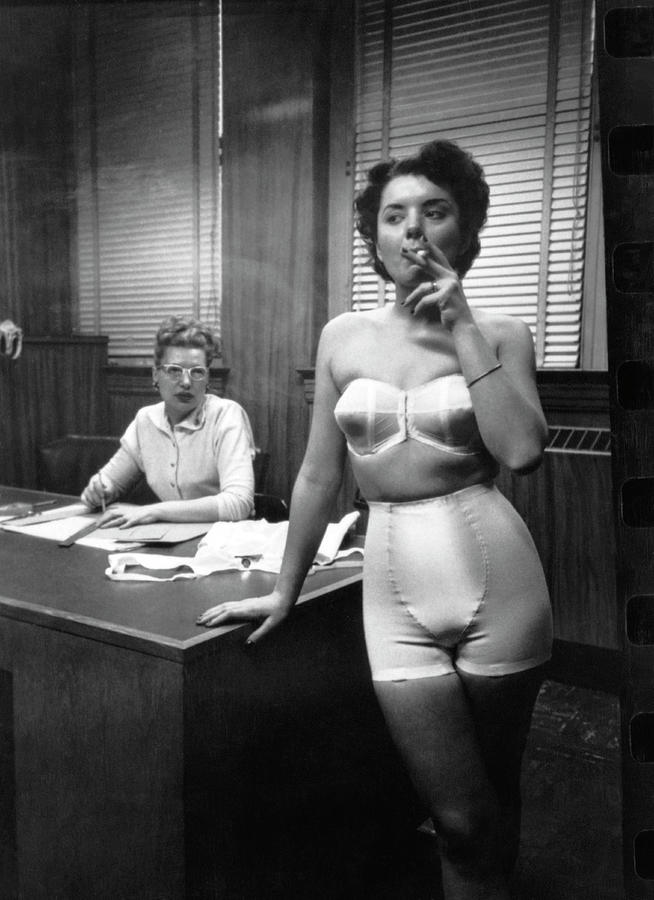 1940s Photograph - Smoking Lingerie Model by Underwood Archives.