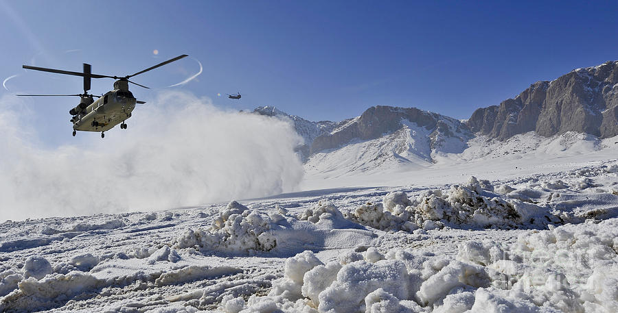 Winter Photograph - Snow Flies Up As A U.s. Army Ch-47 #1 by Stocktrek Images