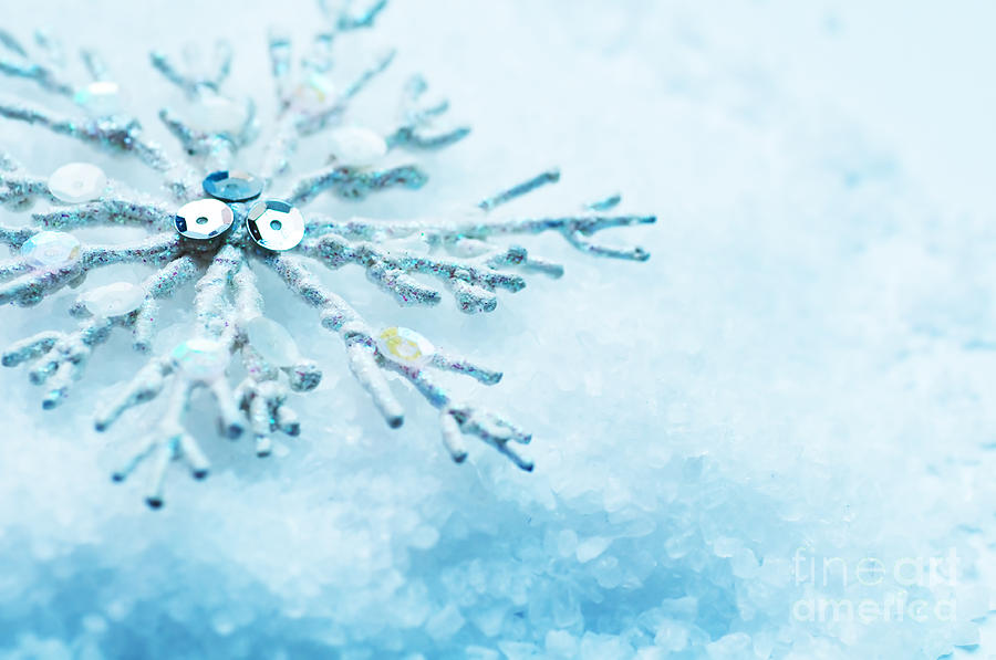 Cold winter glitter background with snowflake Photograph by Michal