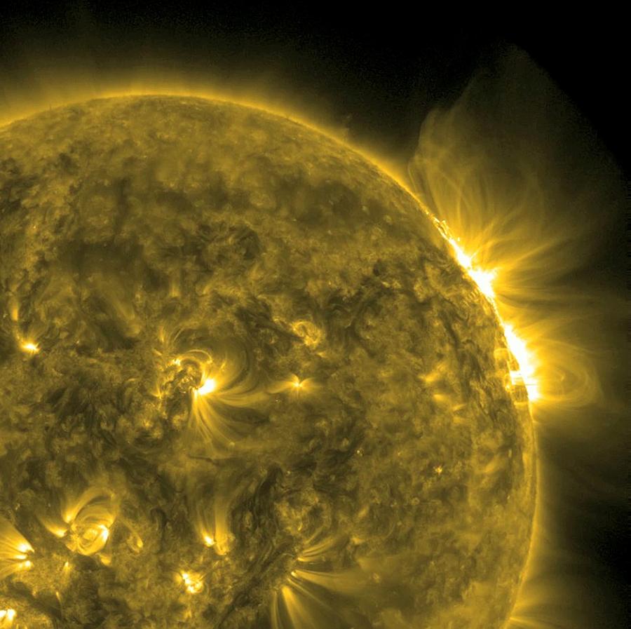 Solar flare, SDO ultraviolet image #1 Photograph by Science Photo Library