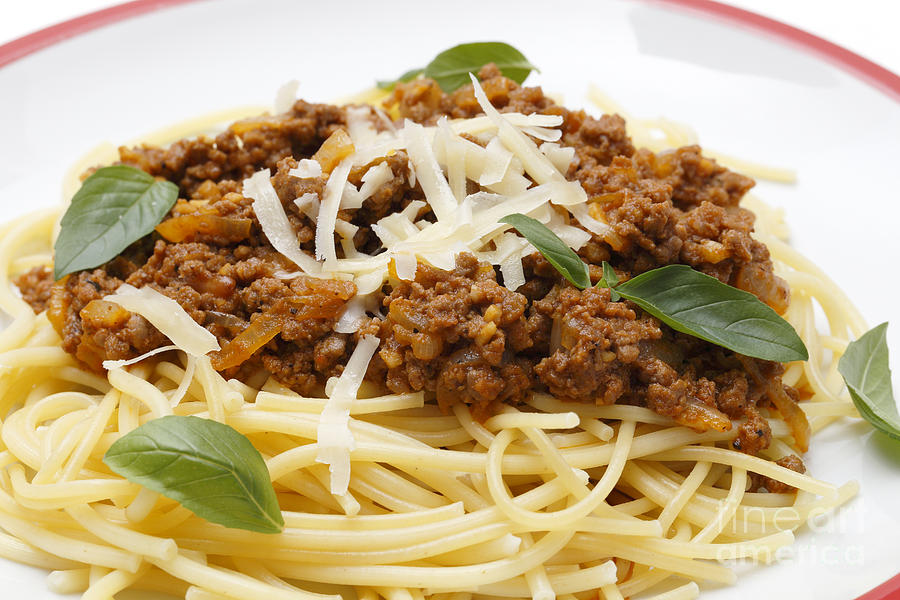 Spaghetti bolognese close-up #1 Photograph by Paul Cowan