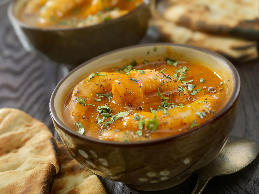 Spicy Red Curry Soup with Shrimp and Naan Bread #1 Photograph by LauriPatterson