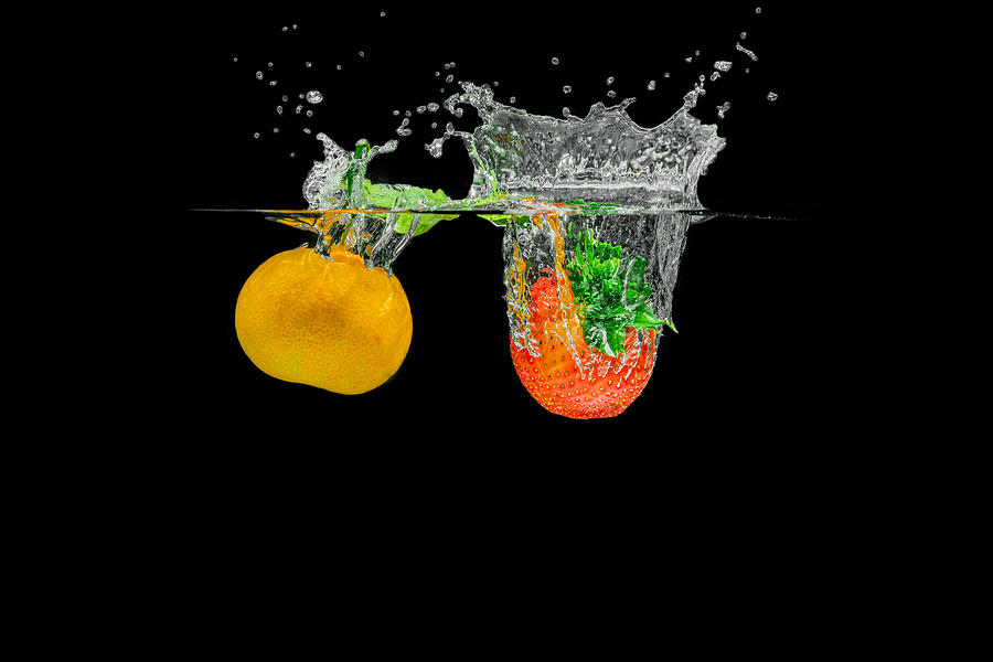 Splashing Fruits #1 Photograph by Peter Lakomy