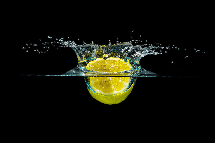 Splashing Lemon #1 Photograph by Peter Lakomy