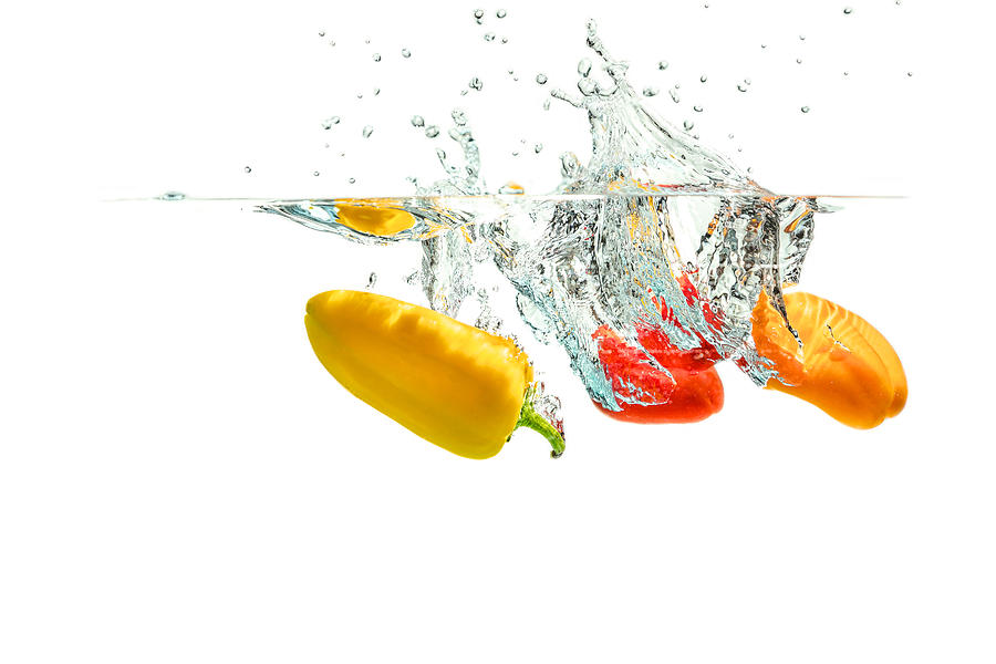 Splashing Paprika #1 Photograph by Peter Lakomy