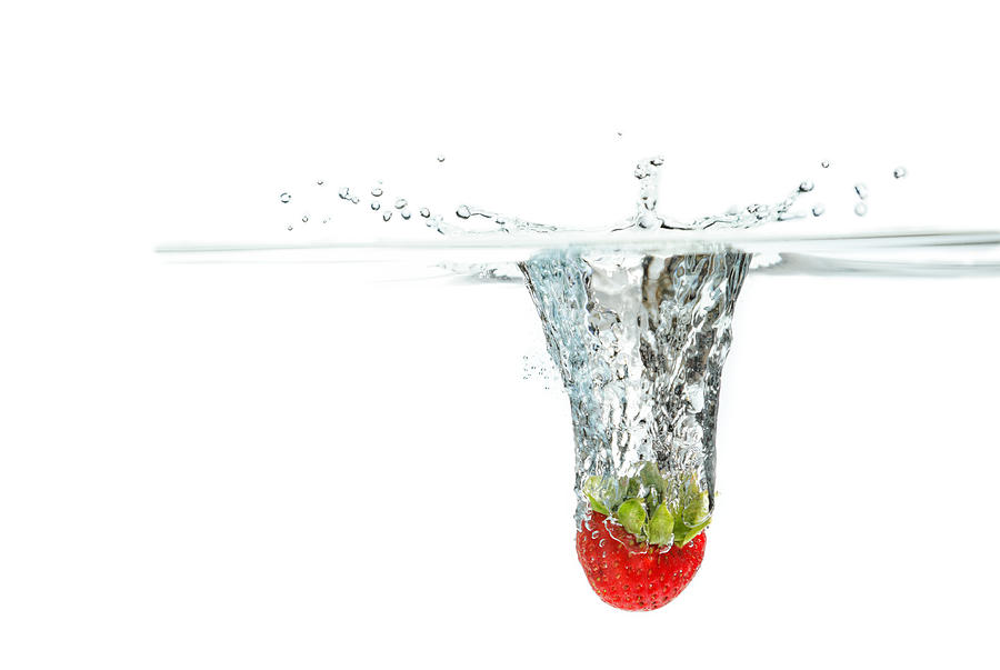 Splashing Strawberry #1 Photograph by Peter Lakomy