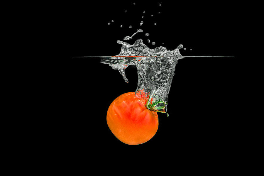 Splashing Tomato #1 Photograph by Peter Lakomy