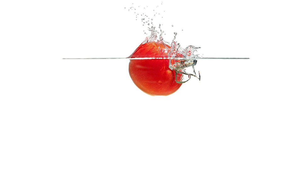 Splashing Tomatoes #1 Photograph by Peter Lakomy