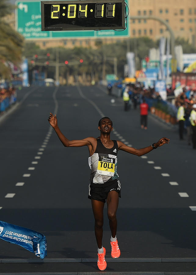 Standard Chartered Dubai Marathon 2017 #1 Photograph by Tom Dulat