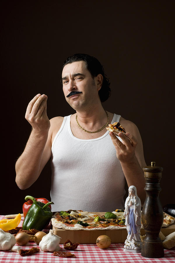 Stereotypical Italian Man Eating pizza and gesturing with hand #1 Photograph by Ragnar Schmuck