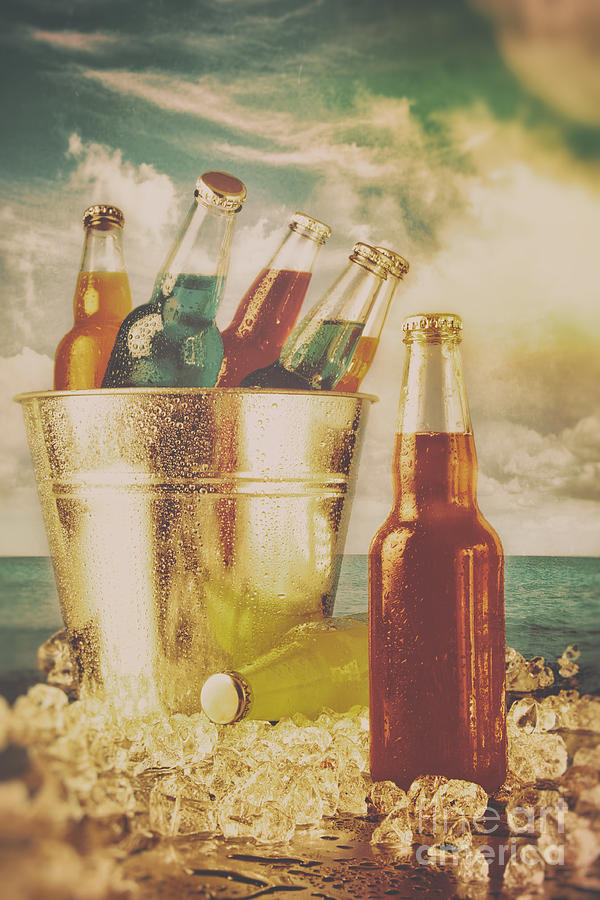 Summer drinks in ice bucket on the beach #1 Photograph by Sandra Cunningham