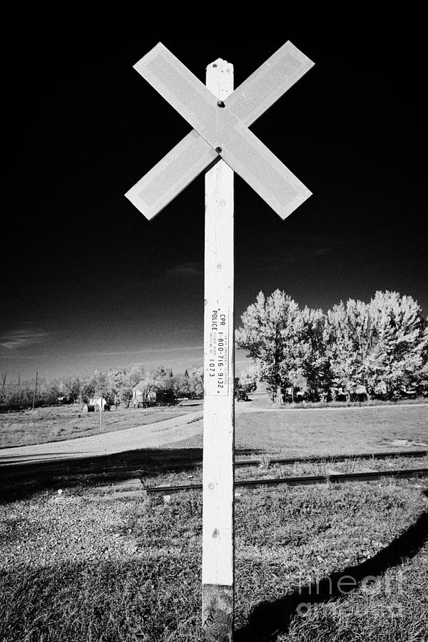 Sign Photograph - sun bleached railroad crossing sign Saskatchewan Canada #1 by Joe Fox