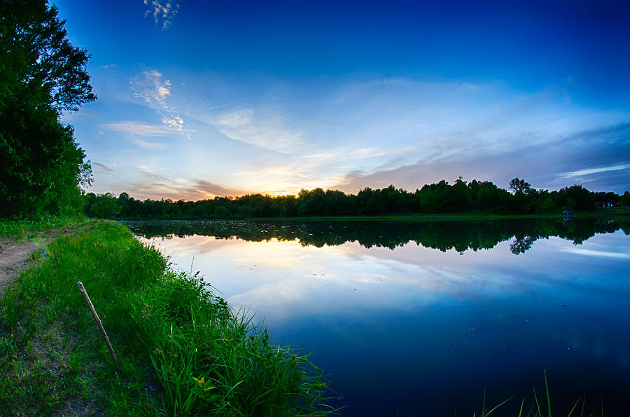 Sun Setting Over A Reflective Lake Photograph by Alex Grichenko - Fine ...