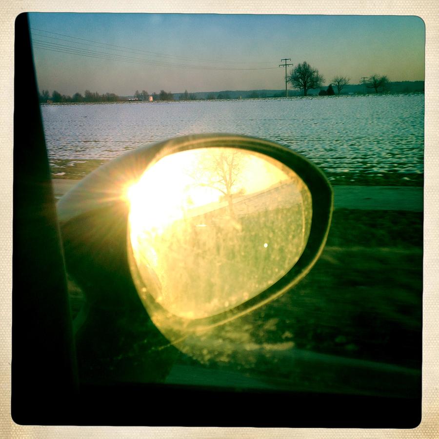 Sunlight in the rear mirror #2 Photograph by Matthias Hauser