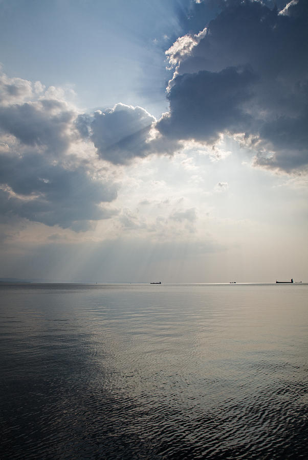 Sunrays scattered by clouds over Trieste Bay #1 Photograph by Ian Middleton