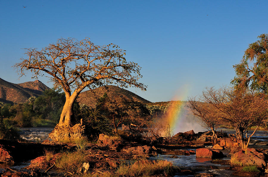 Nature Photograph - Sunset at the Epupa waterfall in Namibia #1 by Grobler Du Preez