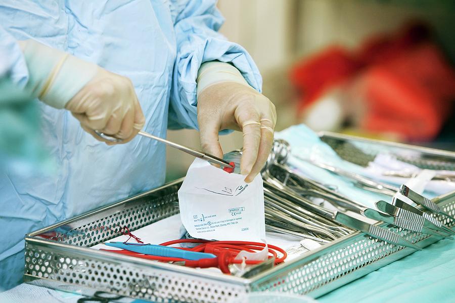 Surgeon With Instruments Photograph By Mark Thomas Science Photo