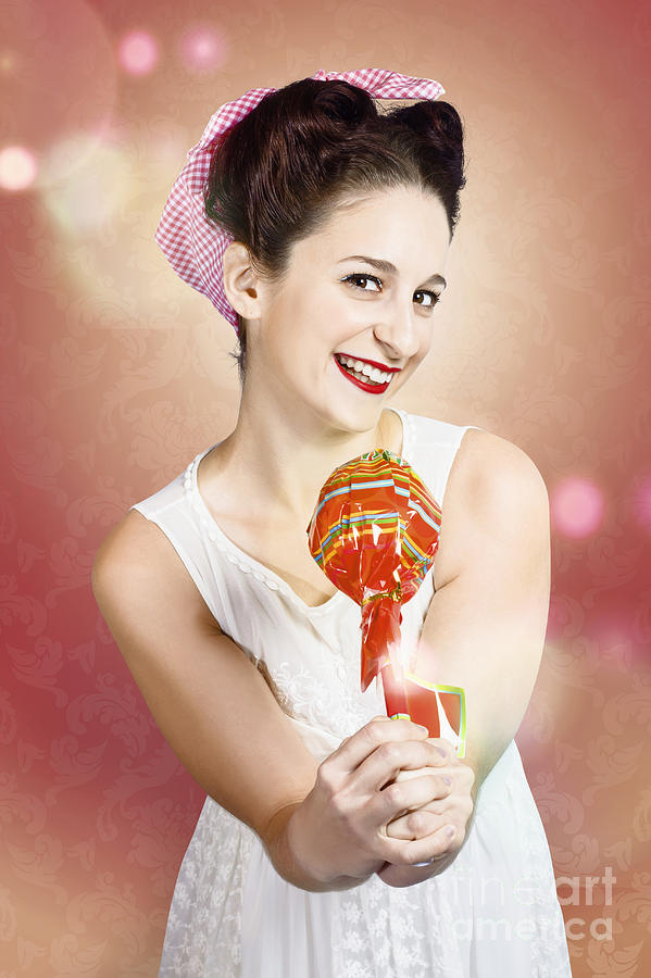 Sweet as sugar lollipop pinup woman offering candy #1 Photograph by Jorgo Photography