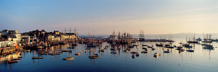 Architecture Photograph - Tall Ships At A Harbor At Sunrise #1 by Panoramic Images