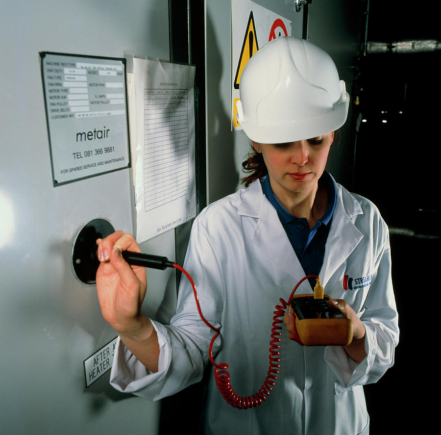 Technician Monitoring Pollutant Levels In Air #1 Photograph by Jerry Mason/science Photo Library