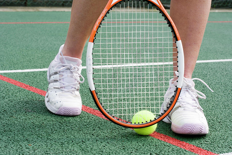 Tennis Racquet And Ball #1 Photograph by Gustoimages/science Photo Library
